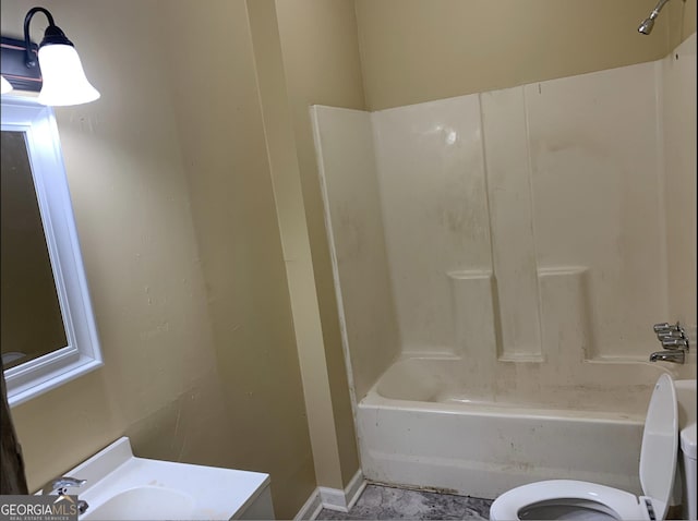 full bathroom featuring shower / bath combination, vanity, and toilet