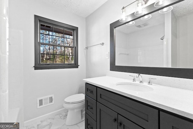 bathroom featuring visible vents, marble finish floor, a textured ceiling, and toilet