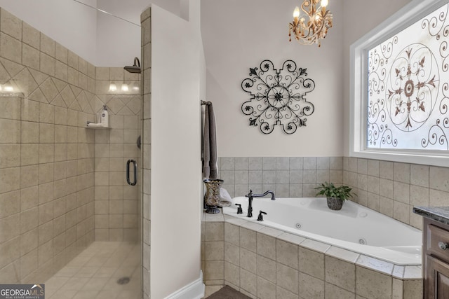 bathroom featuring vanity and plus walk in shower