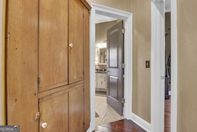 hall with light wood-type flooring