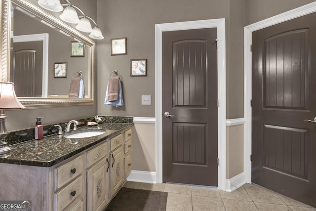 bathroom featuring tile patterned floors and vanity