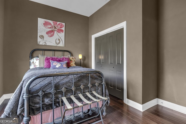 bedroom featuring dark wood-type flooring