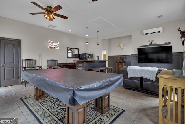 recreation room featuring billiards, an AC wall unit, and light tile patterned flooring