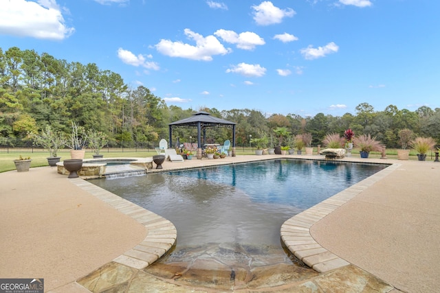 view of pool with a gazebo, an in ground hot tub, and a patio