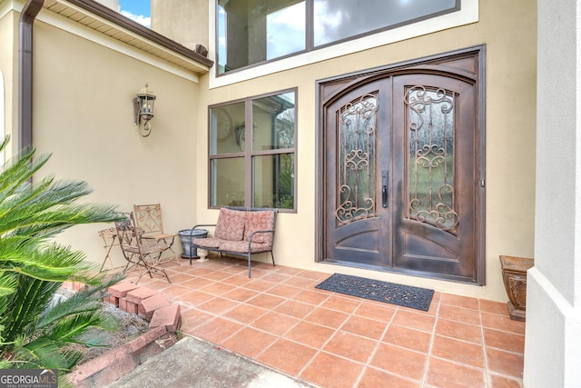 doorway to property featuring french doors