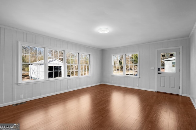 interior space with hardwood / wood-style flooring