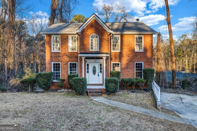 colonial house with a front lawn