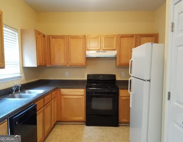 kitchen featuring sink and black appliances