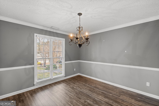 unfurnished dining area with a healthy amount of sunlight, dark wood-type flooring, and crown molding