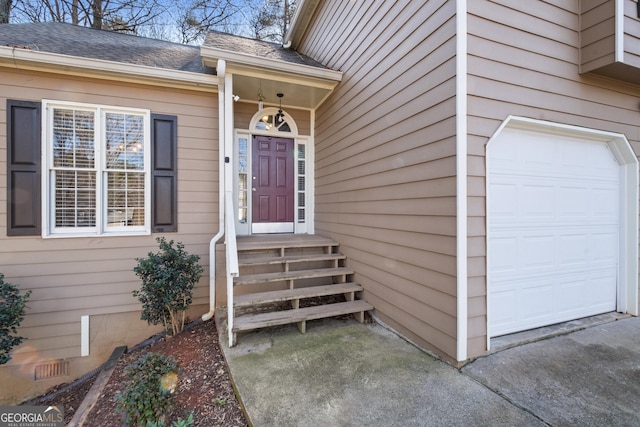 property entrance featuring a garage