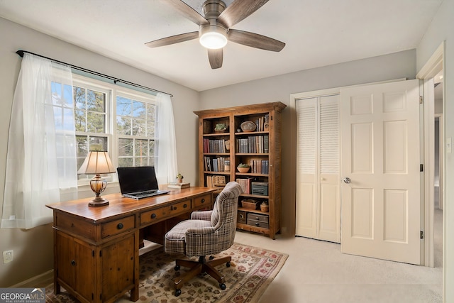 office space with ceiling fan