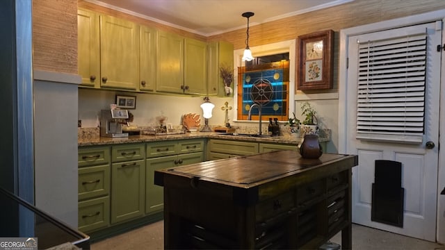 kitchen with a sink and hanging light fixtures