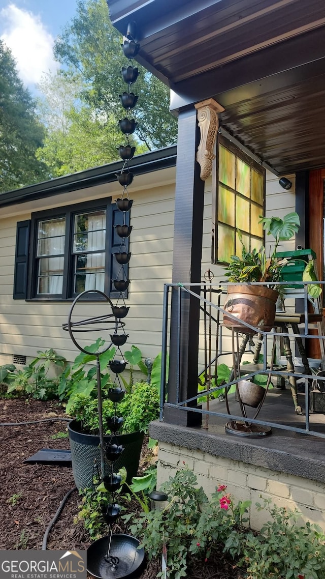 view of property exterior with crawl space