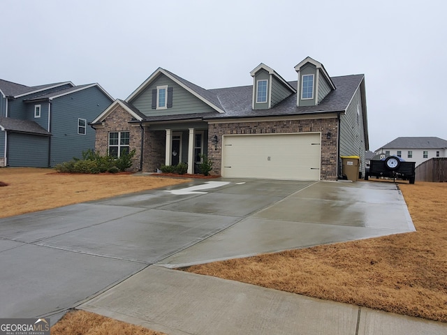 view of front of property featuring a garage