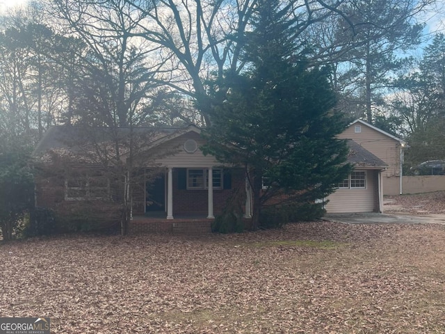 view of front of home featuring covered porch