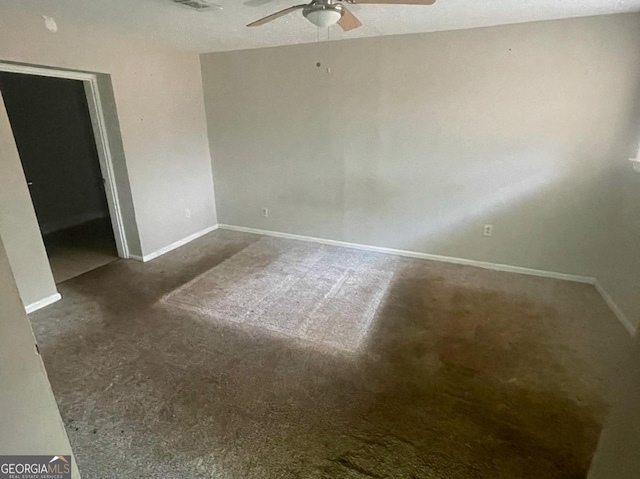 unfurnished room featuring ceiling fan