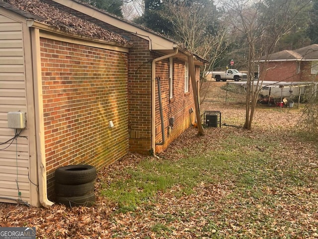 view of side of property featuring cooling unit