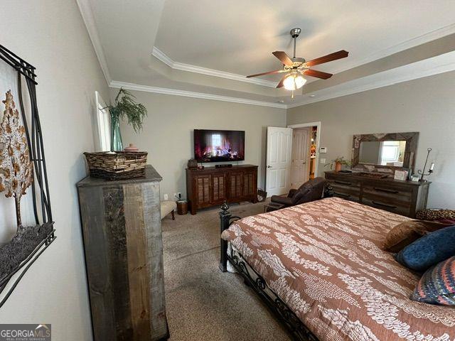 kitchen with lofted ceiling, sink, decorative light fixtures, stainless steel dishwasher, and dark stone counters