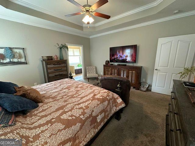 clothes washing area with cabinets, washer and clothes dryer, light hardwood / wood-style floors, and a notable chandelier