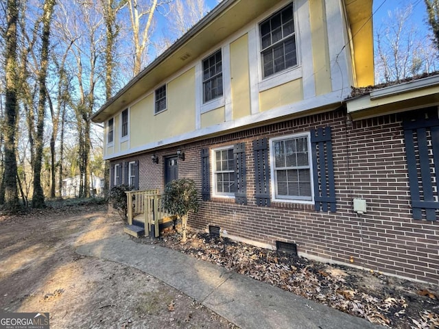 view of front of property with brick siding