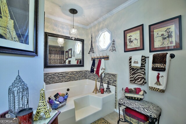 bathroom featuring crown molding and a bathing tub