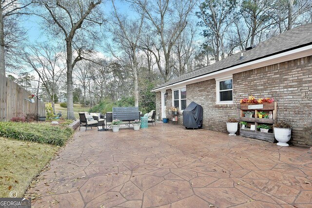 view of patio / terrace featuring a grill and outdoor lounge area