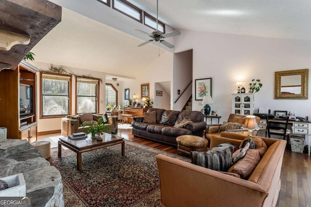 living room featuring wood-type flooring, high vaulted ceiling, and ceiling fan