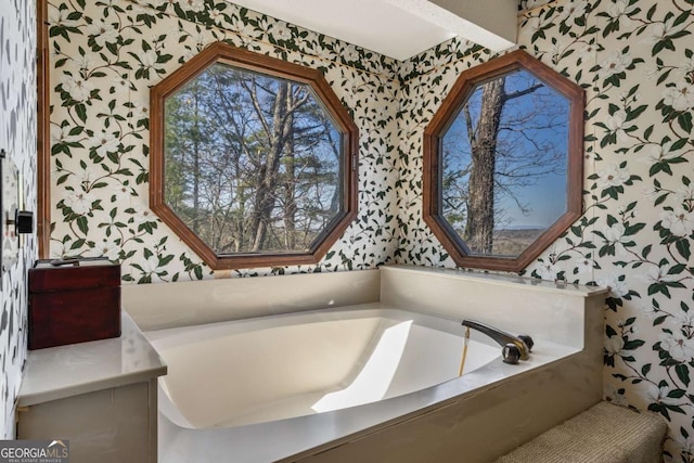 bathroom featuring a tub