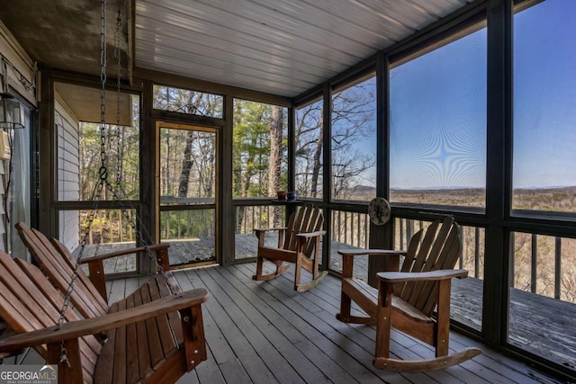 unfurnished sunroom with a healthy amount of sunlight