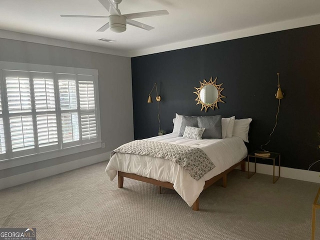 carpeted bedroom featuring ceiling fan