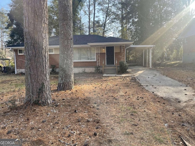 single story home with a carport