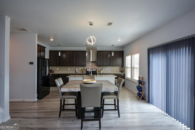 dining area featuring light hardwood / wood-style floors