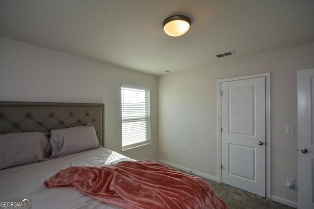 bedroom featuring carpet floors