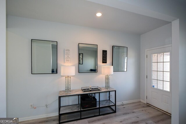 entrance foyer featuring light hardwood / wood-style floors