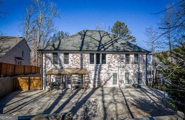 rear view of house featuring a patio