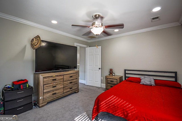 bedroom with ceiling fan, ornamental molding, and carpet flooring