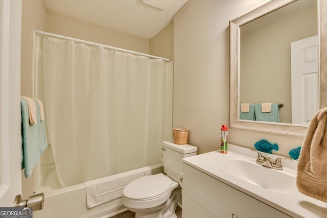 full bathroom featuring vanity, toilet, and shower / bathtub combination with curtain