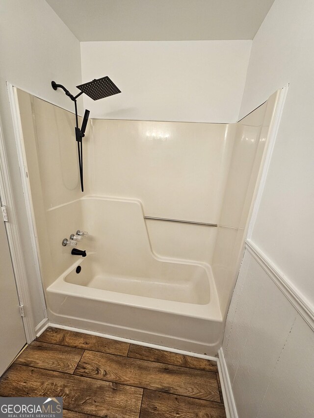 bathroom with hardwood / wood-style flooring, vanity, and toilet