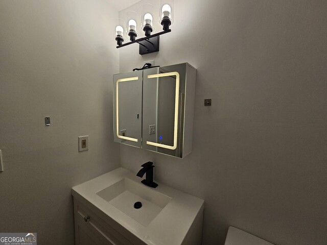 bathroom with washtub / shower combination and hardwood / wood-style floors