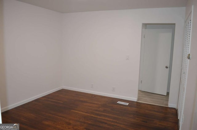4447 Pharr Ave, Macon, GA 31204 - spare room with dark hardwood / wood-style floors