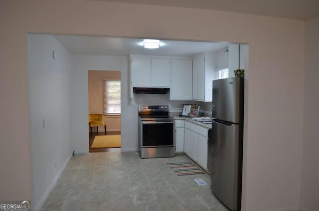 4447 Pharr Ave, Macon, GA 31204 - kitchen featuring stainless steel appliances and white cabinets