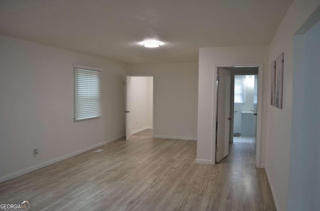 4447 Pharr Ave, Macon, GA 31204 - empty room with light hardwood / wood-style flooring and a textured ceiling