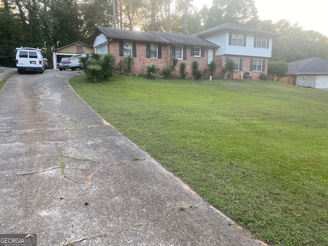 view of front of property with a carport and a front lawn