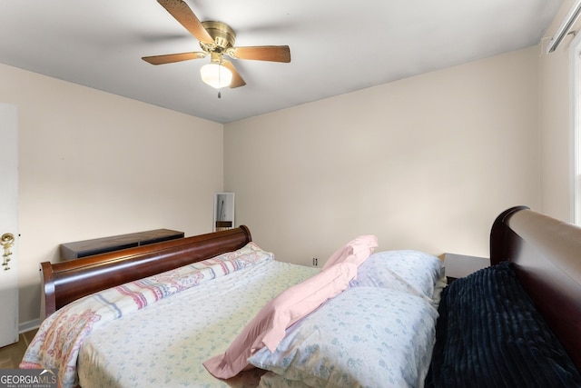 bedroom featuring ceiling fan