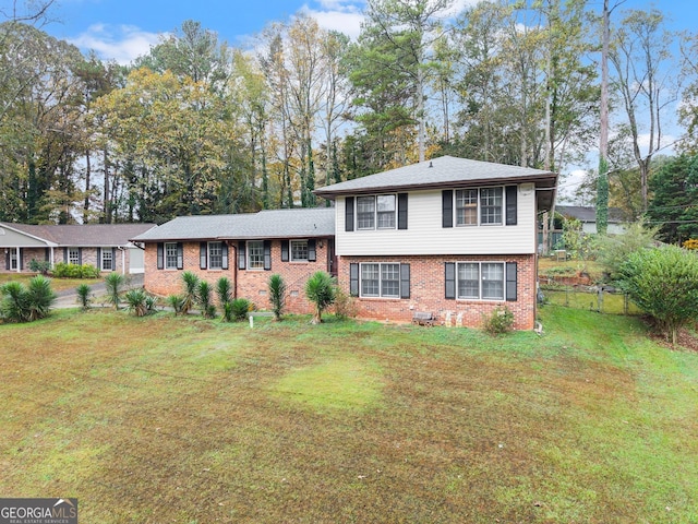 split level home with a front yard