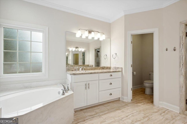 bathroom with ornamental molding, vanity, a bathtub, and toilet