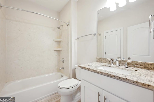 full bathroom with vanity, shower / washtub combination, and toilet