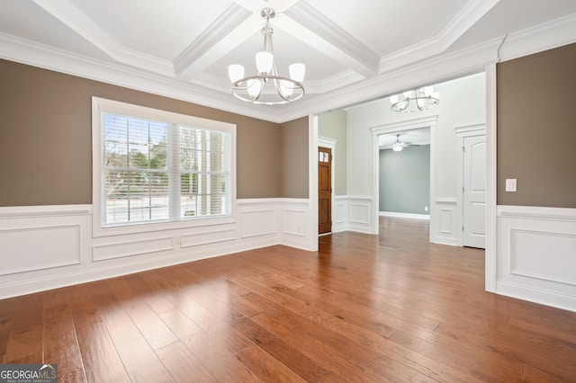 unfurnished dining area featuring coffered ceiling, beam ceiling, wood-type flooring, and a chandelier