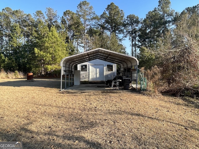 view of outbuilding with a carport