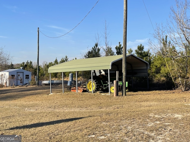 view of outbuilding featuring a carport